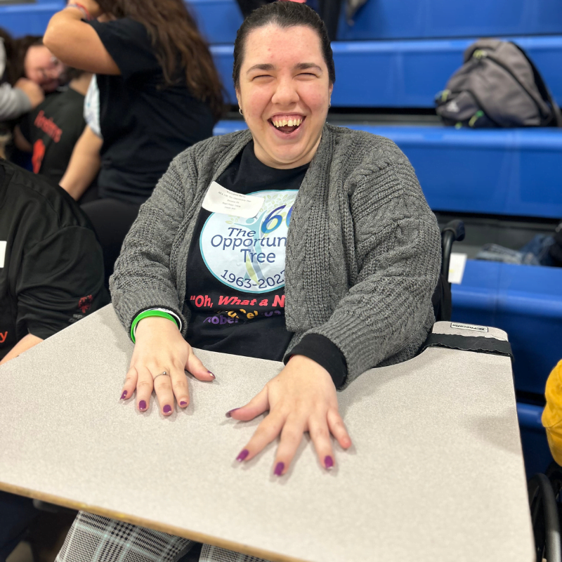 The Opportunity Tree member is happy